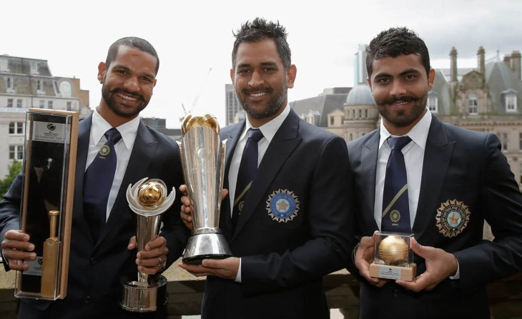 Shikhar Dhawan with Man of the Tournament, MS Dhoni with ICC Champions Trophy and Ravindra Jadeja with Man of the Match Award in Finals.