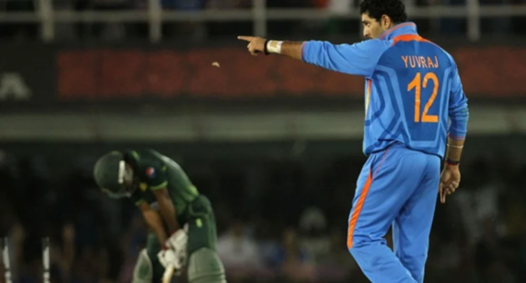 Yuvraj Singh celebrates after dismissing Asad Shafiq for 30 runs off 39 balls.