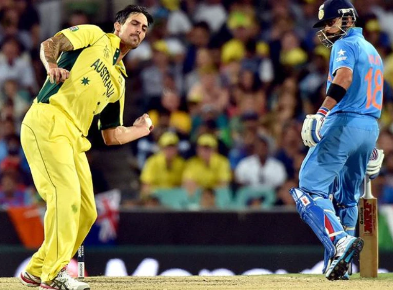 Mitchell Johnson celebrates after dismissing Virat Kohli for 1 run in the Semi-Finals.