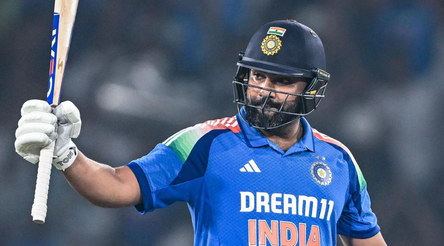 Rohit Sharma surpassing Rahul Dravid to enter the top 10 ODI run-getters list.