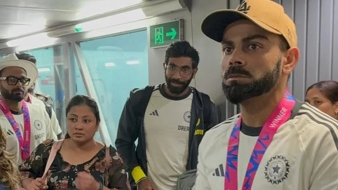 Virat Kohli's warm hug to a woman at Bhubaneswar airport went viral.