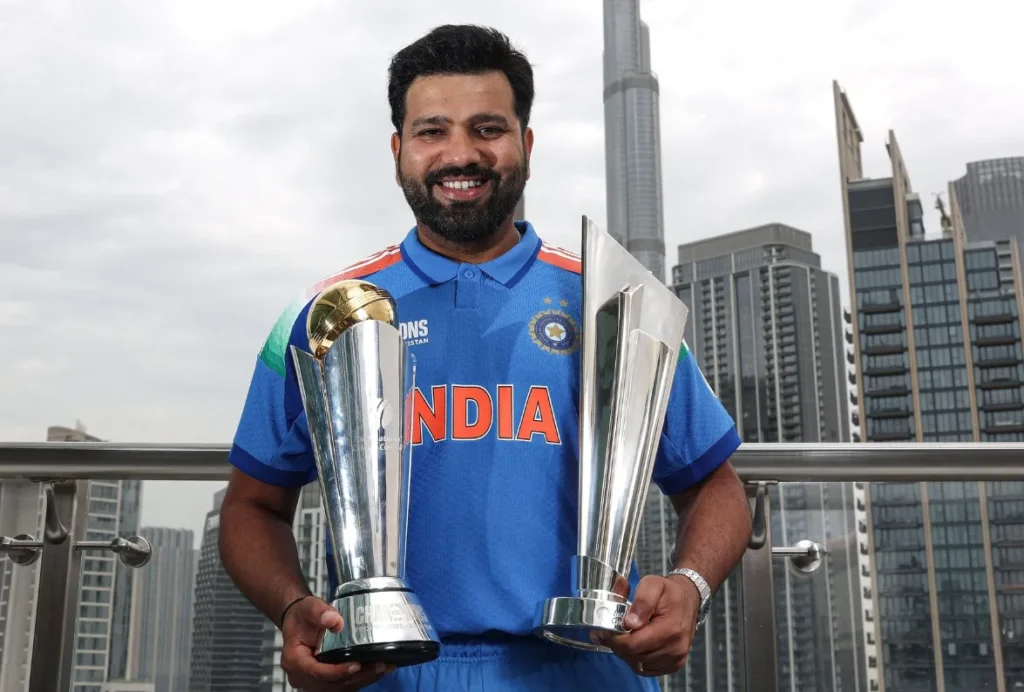 Rohit Sharma with the ICC Champions Trophy and the T20 World Cup.