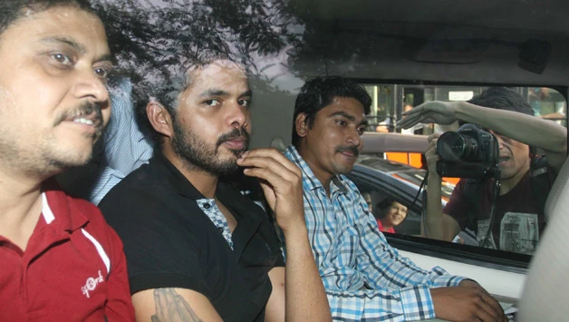 S Sreesanth being taken to jail by Delhi Police.