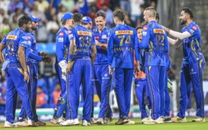 Mumbai Indians crush Delhi Capitals to qualify for playoffs.