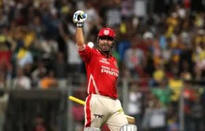 Virender Sehwag celebrating his century in the 2nd Qualifier.