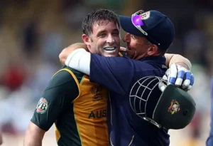 Michael Hussey celebrating the win with his coach.