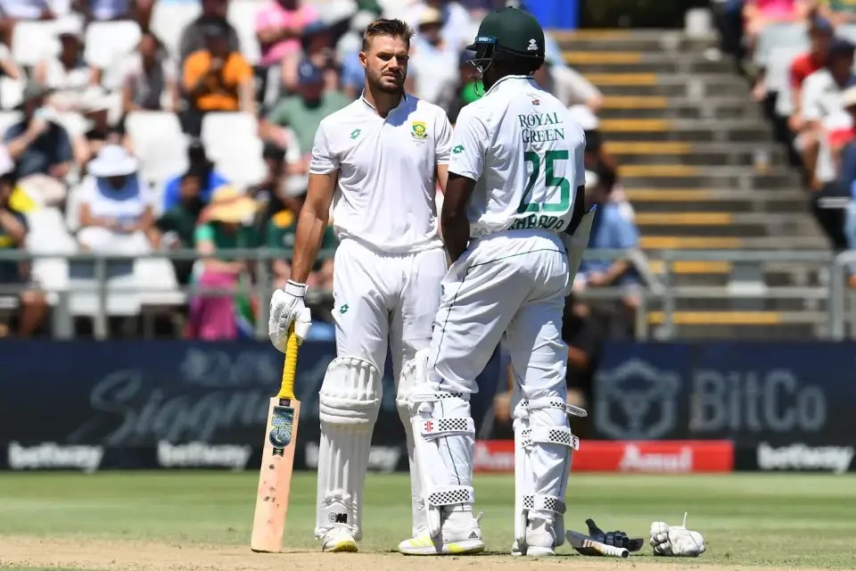 Aiden Markram and Kagiso Rabada talk between overs.