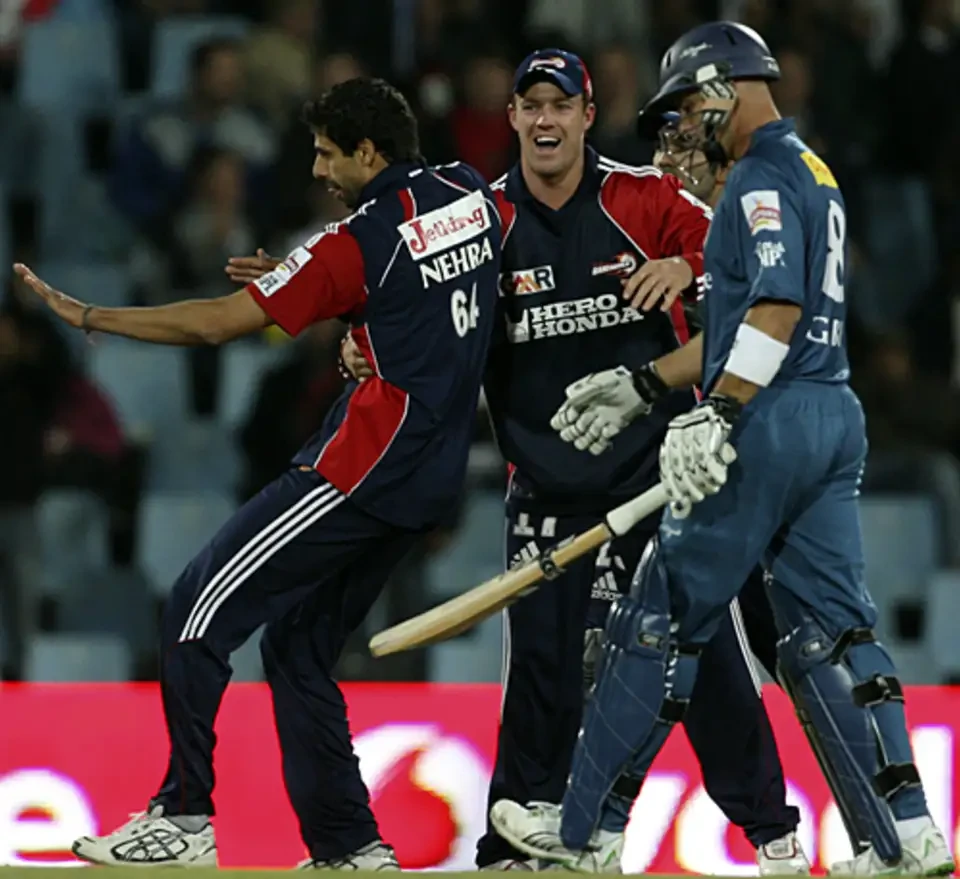 Team celebrate Herschelle Gibbs' wicket.