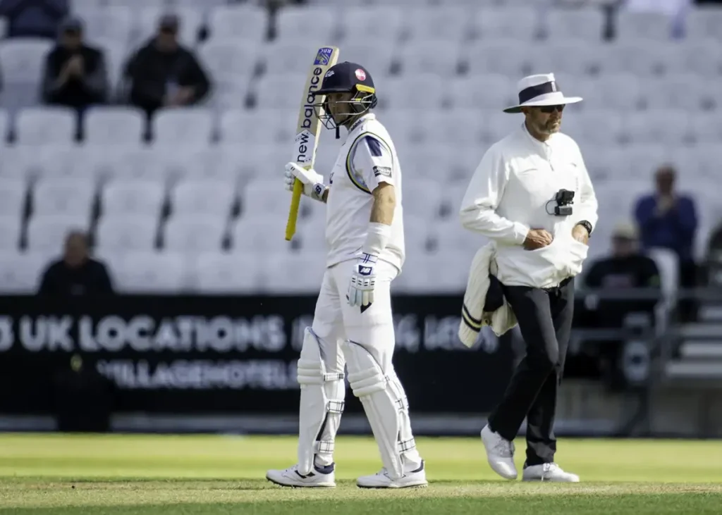 Joe Root receives applause for his fifty points.