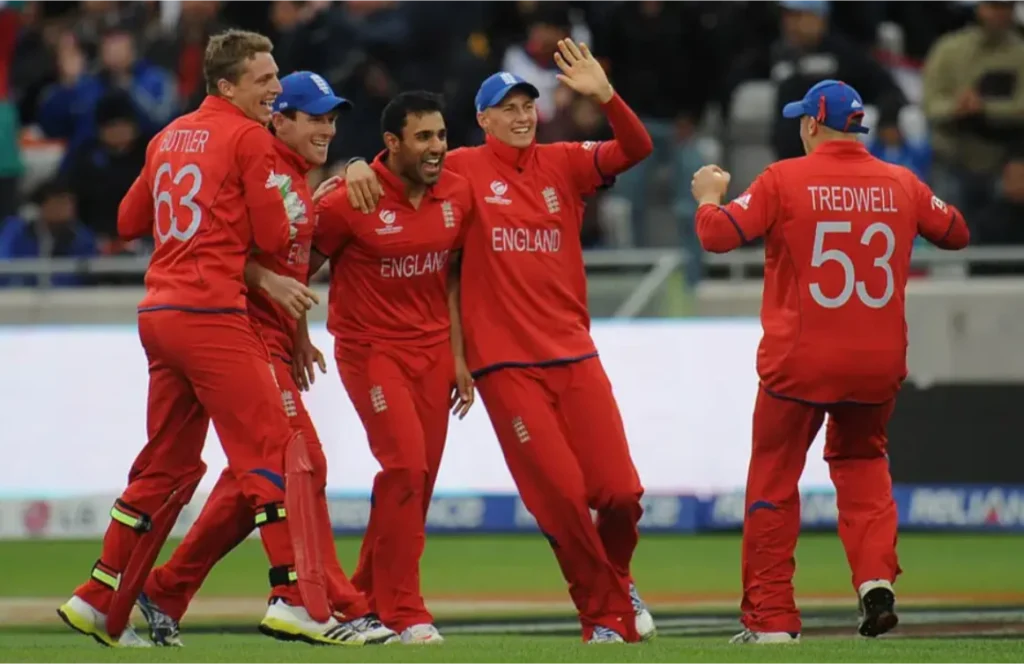 England players celebrate after dismissing MS Dhoni for a duck.