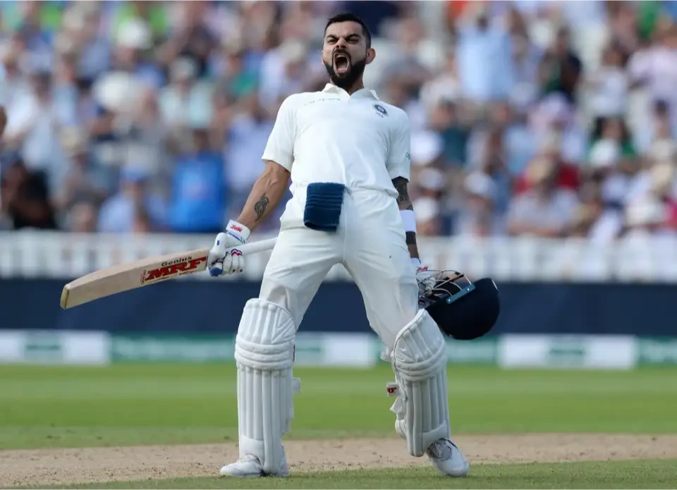 Virat Kohli celebrates after scoring his 22nd Test century.