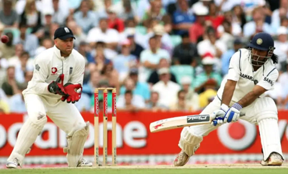 Mahendra Singh Dhoni plays a reverse sweep watched by Matt Prior.