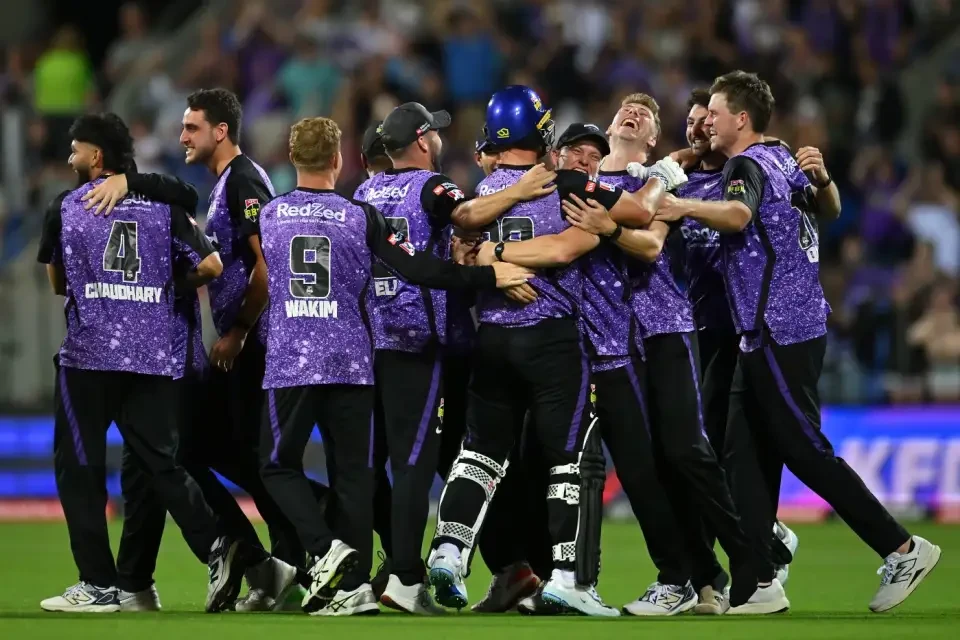 Hobart Hurricanes celebrate their big moment.
