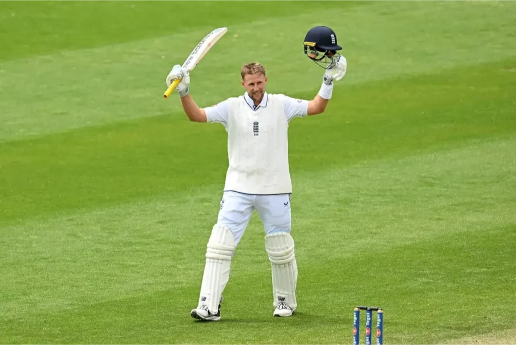 Joe Root celebrates after scoring a century.