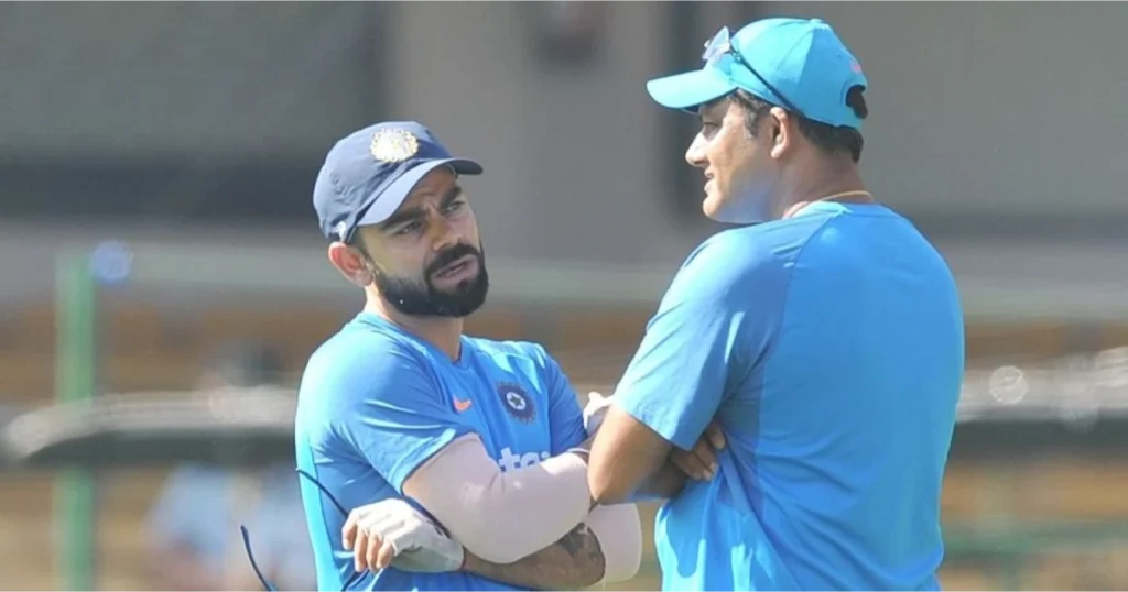 Virat Kohli and Kumble having a chat.