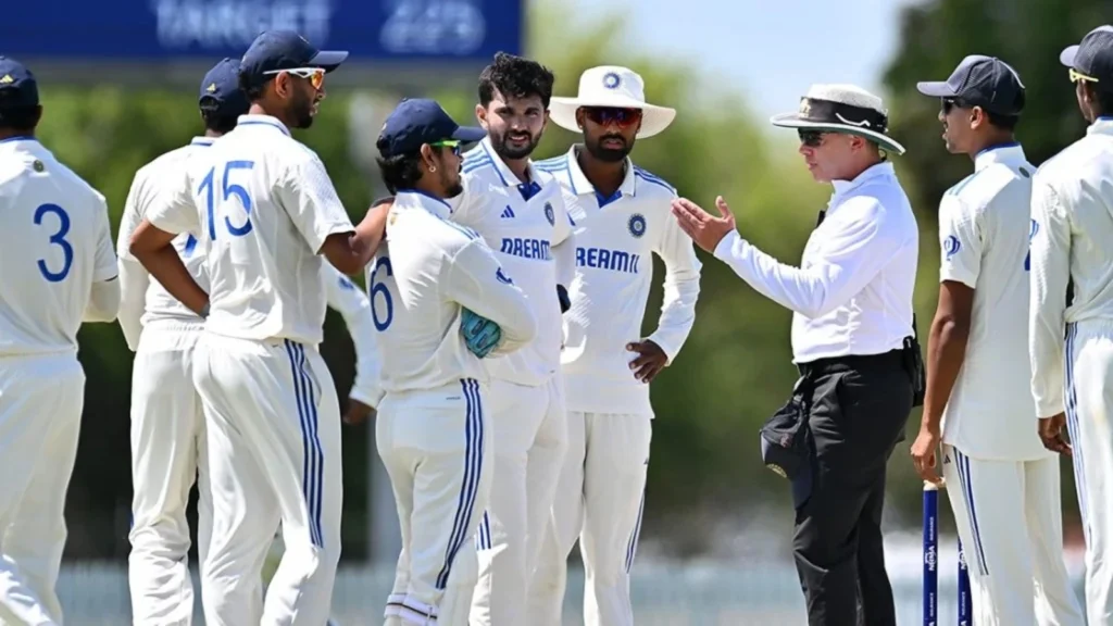 Ishan Kishan having a chat with the umpires.