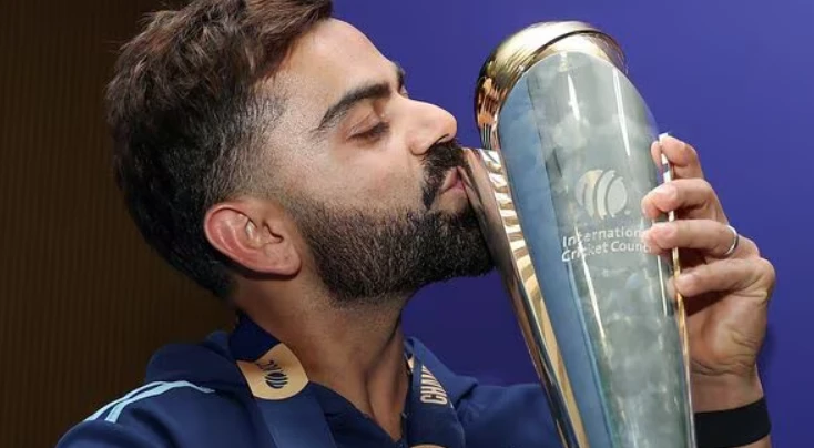Virat Kohli with the ICC Champions Trophy 2025.