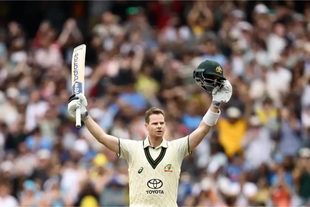 Stephen Smith celebrates a century in the fourth Test against India.