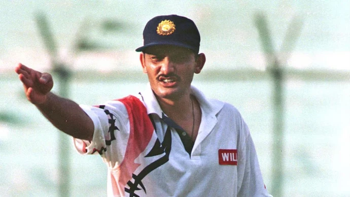 Azharuddin giving instructions to the fielders.