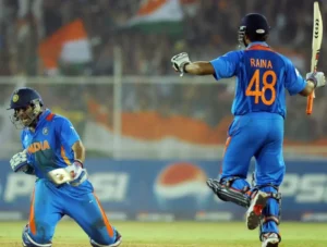 Suresh Raina and Yuvraj Singh celebrate after winning the Quarter-Finals against Australia.