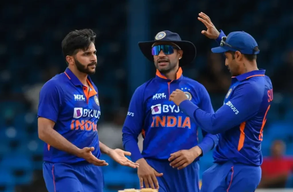 India celebrates after winning the match by 3 runs.