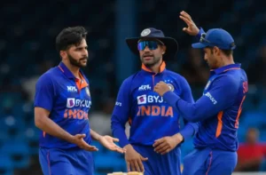 India celebrates after winning the match by 3 runs.