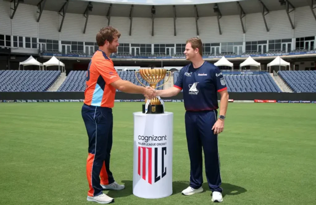 Steve Smith and Corey Anderson with the MLC Trophy.