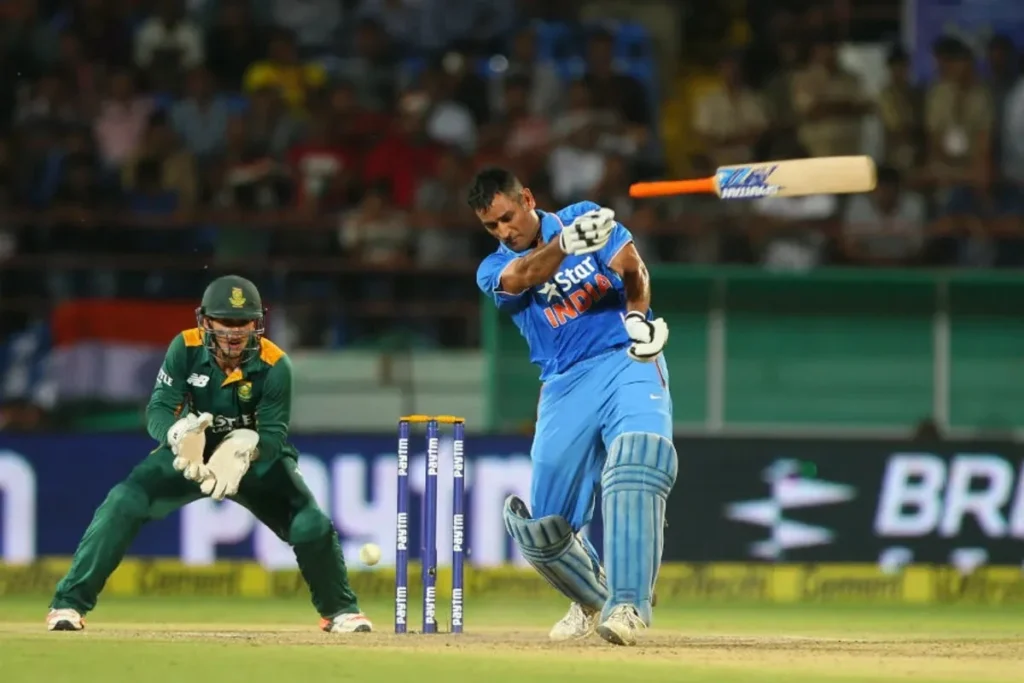 MS Dhoni loses hold of his bat against Duminy.