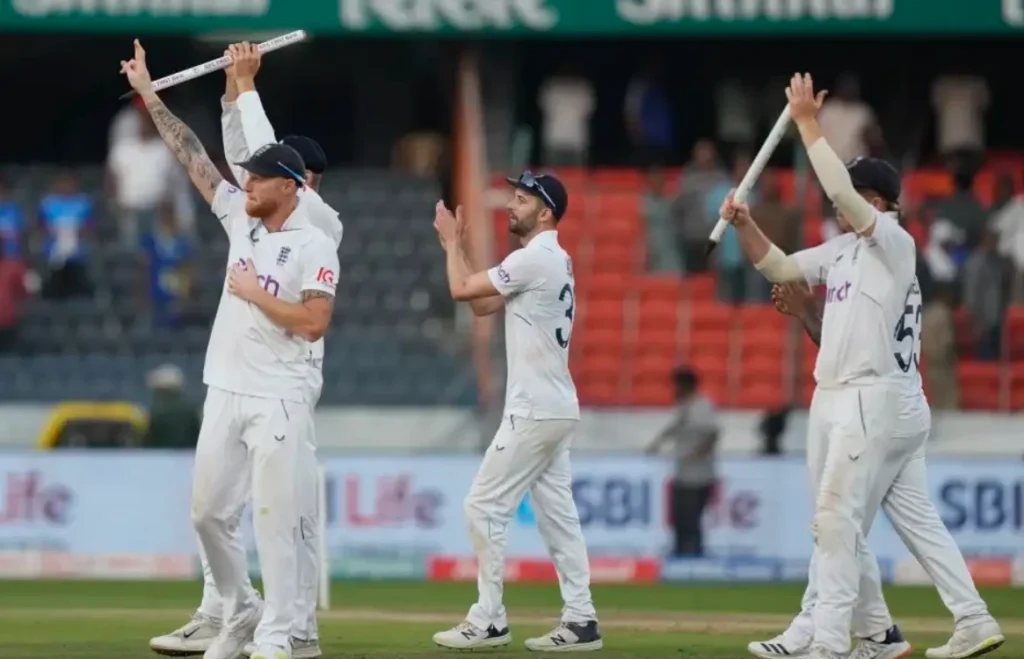 England team celebrates after winning the match against India.