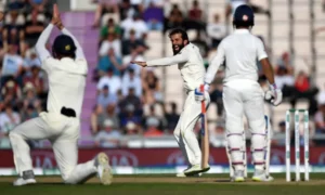 Moeen Ali celebrates after getting the wicket of Ajinkya Rahane.