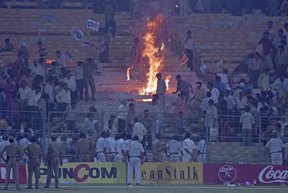 Indian fans lit fire in the stands.