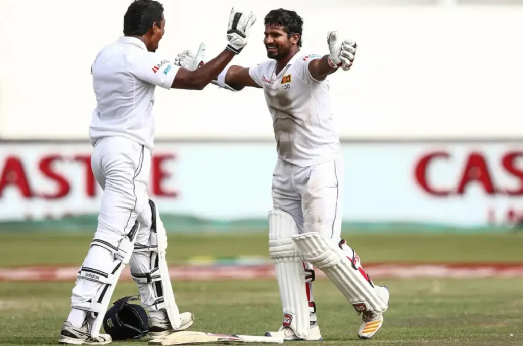 Kusal Perera and Vishwa Fernando celebrate after winning the match.