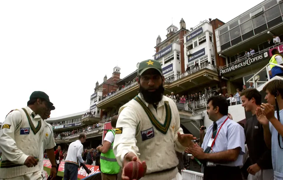 Mohammed Yousuf posing with the ball.