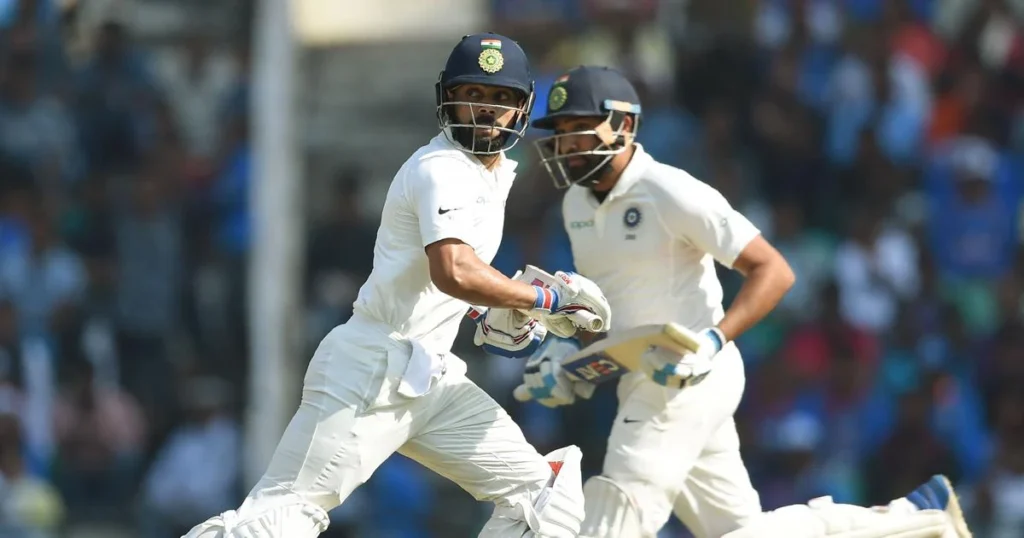 Virat Kohli and Rohit Sharma run between the wickets.