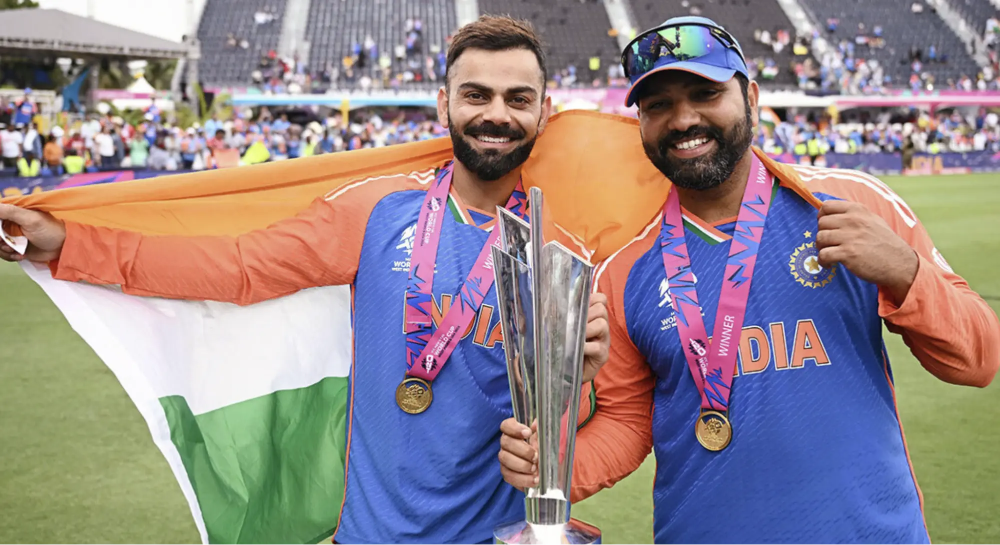 Rohit Sharma and Virat Kohli with the trophy.