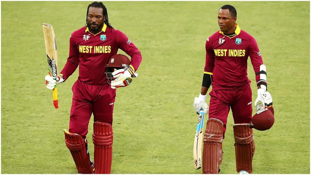 Marlon Samuels and Chris Gayle walking back together.