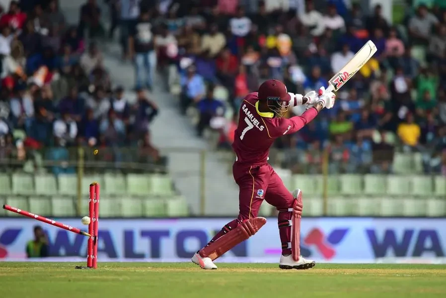 Samuels loses his wicket while attempting to go big.