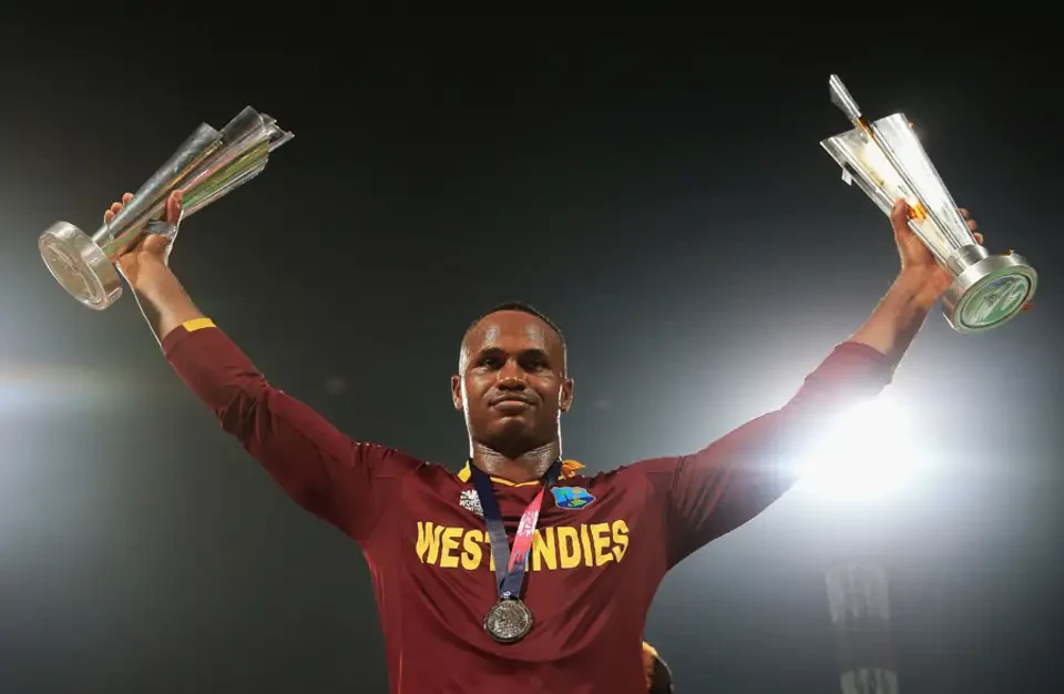 Marlon Samuels with POTM and T20 World Cup trophy.