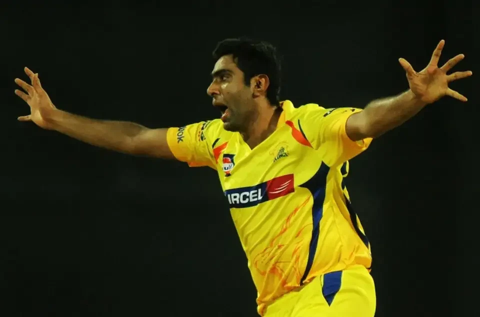 Ravichandran Ashwin celebrates after taking the wicket of Chris Gayle.