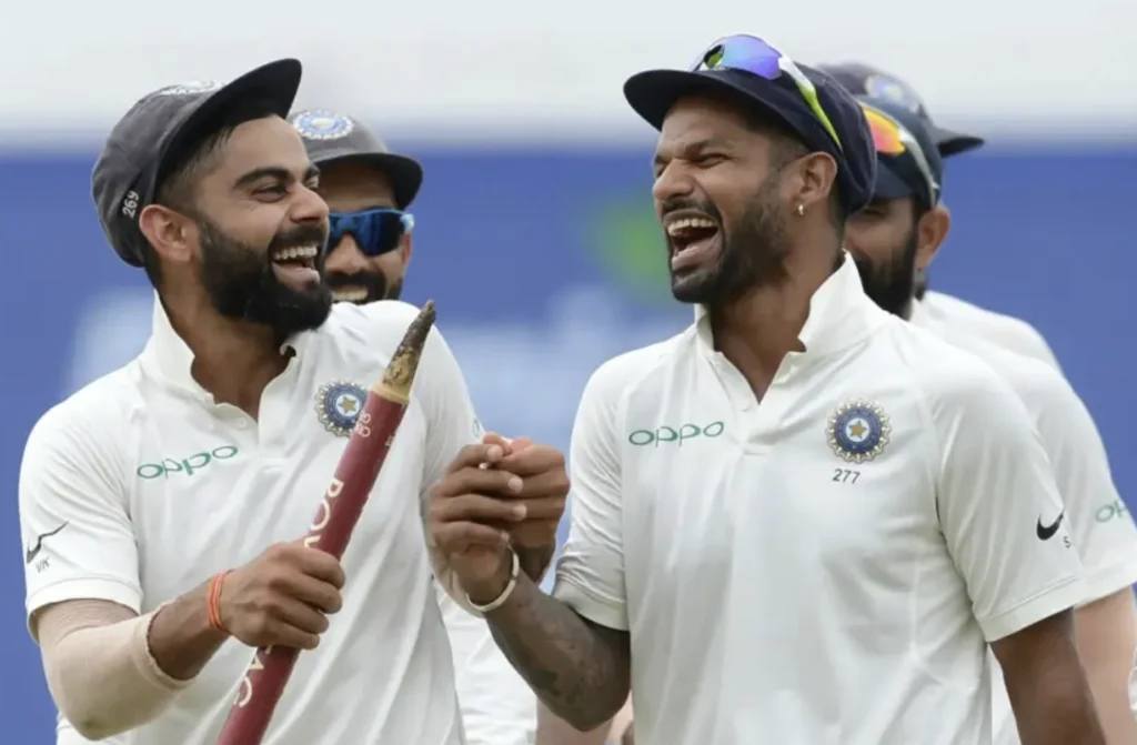 Virat Kohli and Shikhar Dhawan celebrate after India's defeat of Sri Lanka.