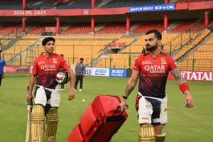Swastik Chikara and Virat Kohli in the practice session.