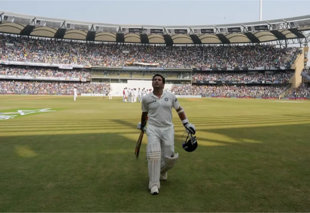 Tendulkar departs after scoring a century.