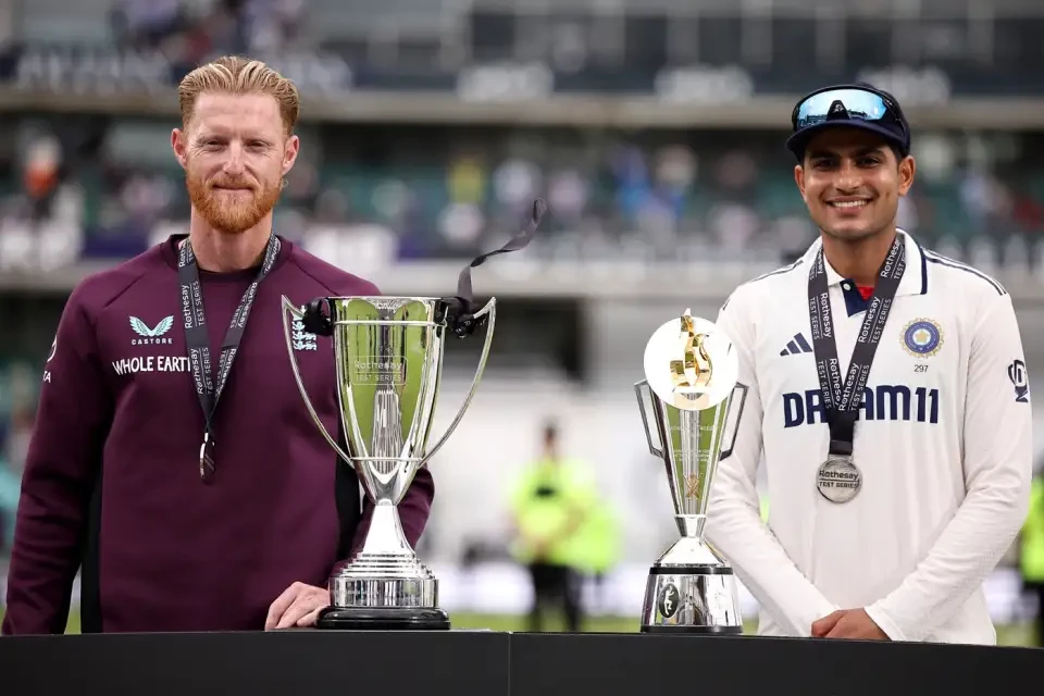 Shubman Gill and Ben Stokes sharing the Anderson-Tendulkar Trophy.