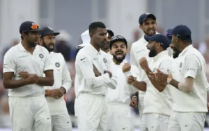 Indian team celebrates after defeating England by 203 runs.