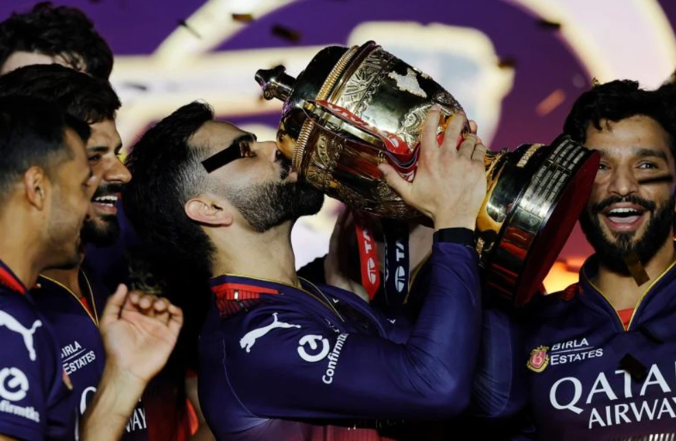 Virat Kohli with the IPL Trophy.