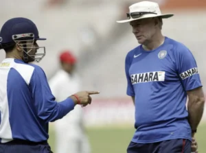 Virender Sehwag and Greg Chappell having a discussion.