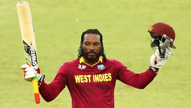 Gayle celebrates after completing a ton.