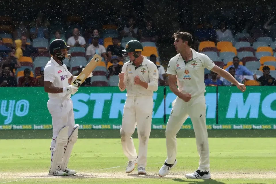 Pat Cummins celebrates dismissing Chheteshwar Pujara.