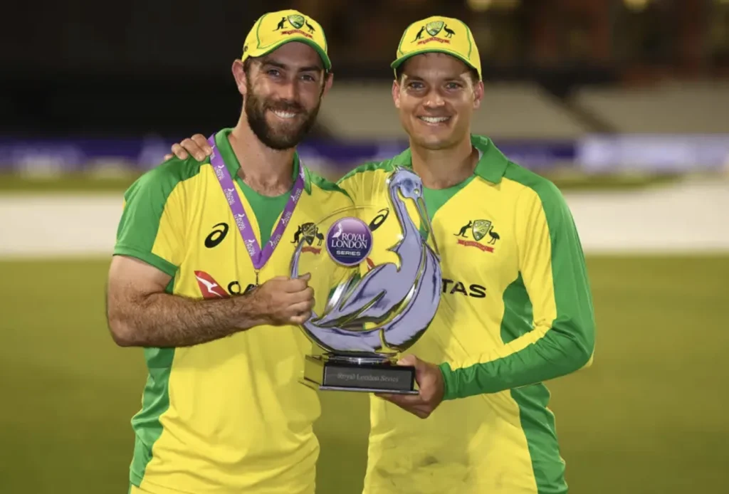 Alex Carey and Glenn Maxwell with the Trophy.