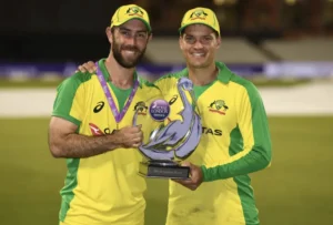 Alex Carey and Glenn Maxwell with the Trophy.